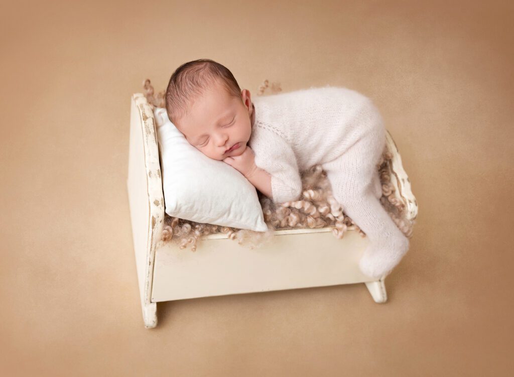 Newborn baby boy photos neutral setup sleepy pose Brooklyn NYC
