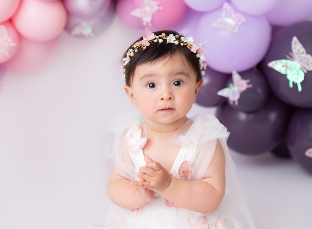 1st Birthday baby girl cake smash pictures link lavender purple Brooklyn Ny